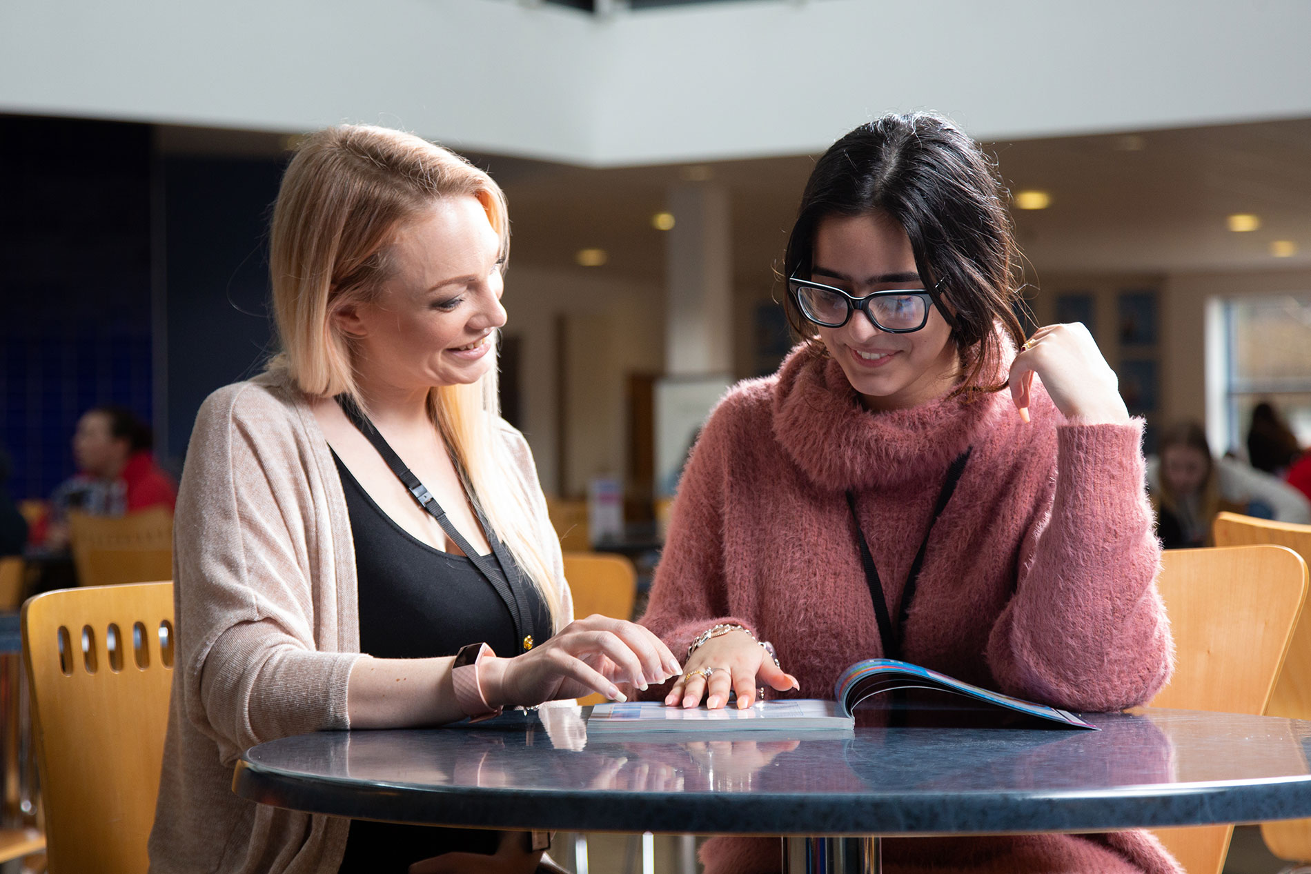 Staff giving iag to student