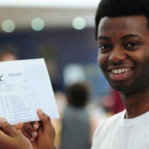 Male student with certificate