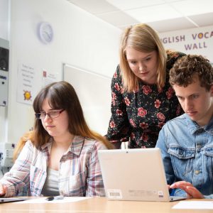 Lecturer helping inclusion students