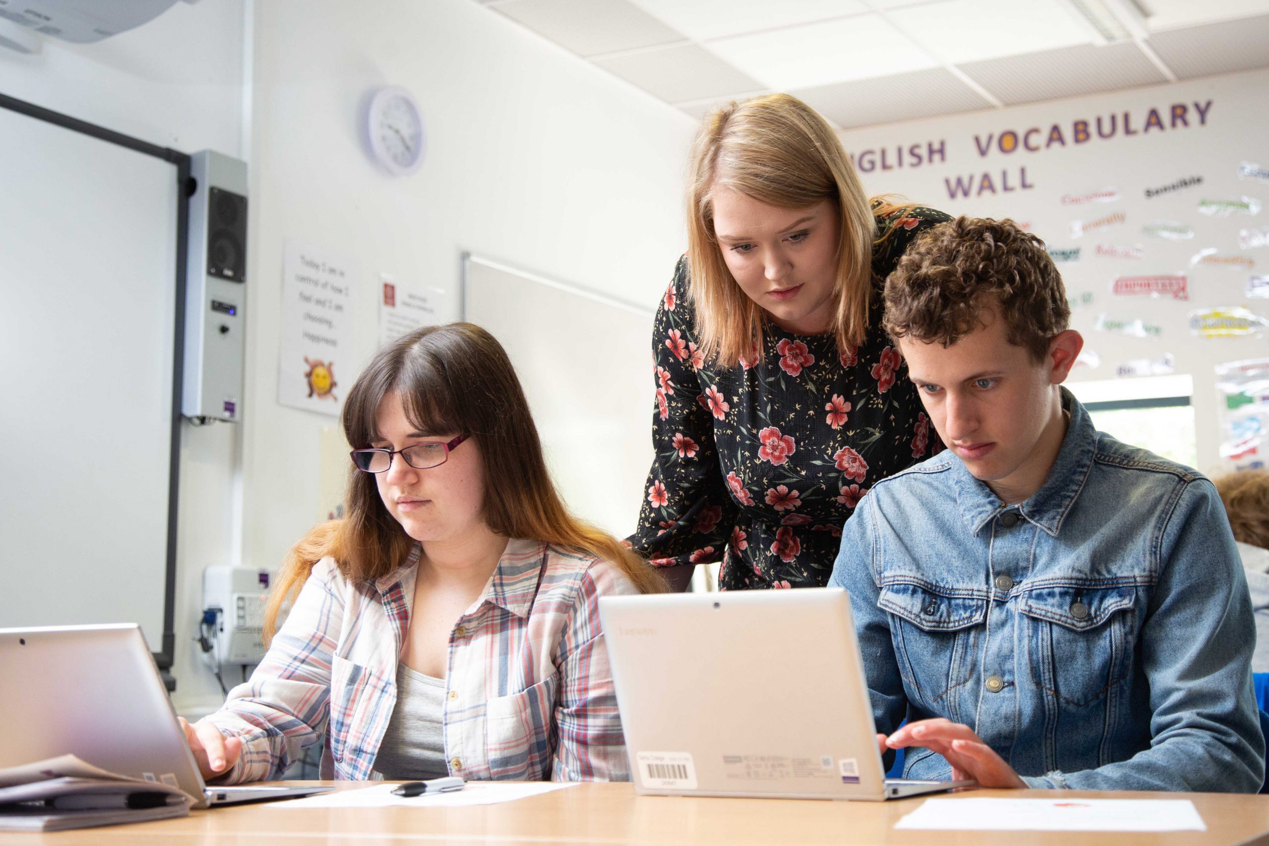 Lecturer helping inclusion students