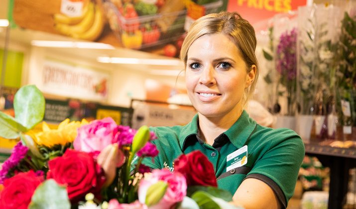 Amy Sykes holding a bouquet of flowers