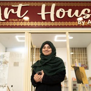 Aqsa Yaqoob in front of her shop, Art House