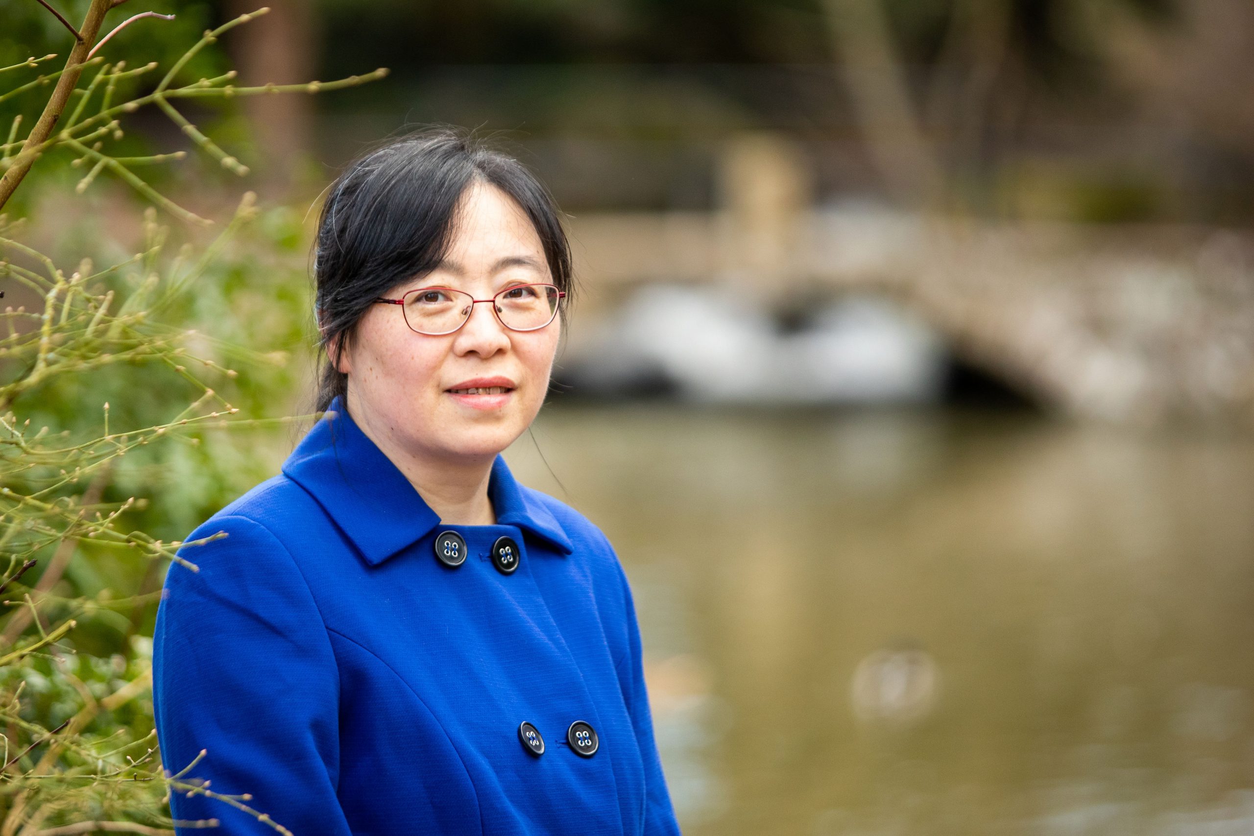 Chunyan Baker stood by a pond