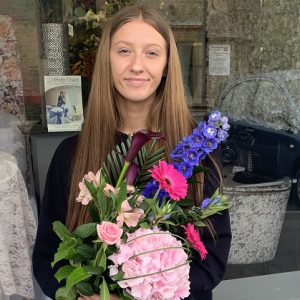 Katie Haslam holding a bouquet