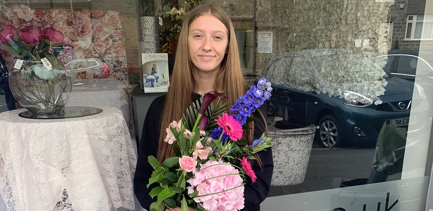 Katie Haslam holding a bouquet