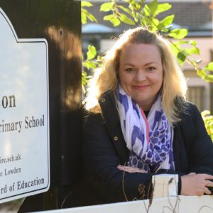 Laura Stevens outside of the primary school she works at