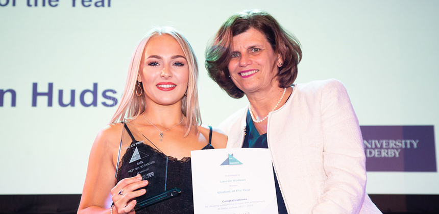 Lauren Hudson collecting her Student of the Year award