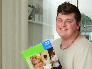 Lewis Morrell reading a book