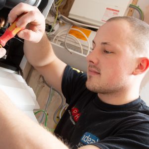 Ryan Pearch working on a boiler