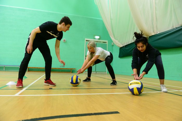 Students being coached in the gym at Broomfield Sports Hall