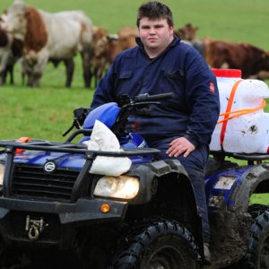 Tom Longdon sat on a buggy