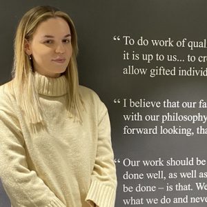 Former Derby College student Alice Lamb stood against a wall.