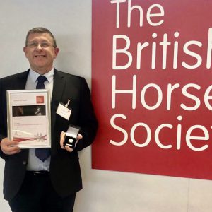 Head of Landdbased studies Jon Collins with his award from the BHS