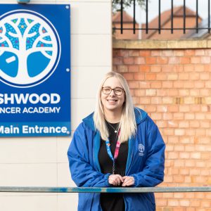 Jess Hales stood outside of Ashwood Spencer Academy.