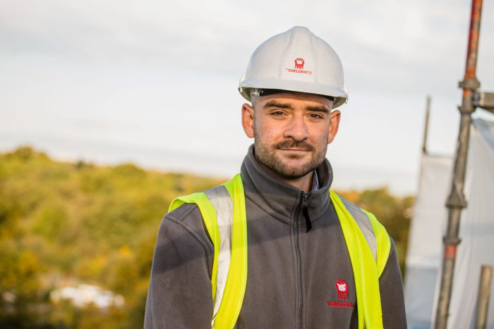 Ed Smith wearing PPE whilst on a construction site.