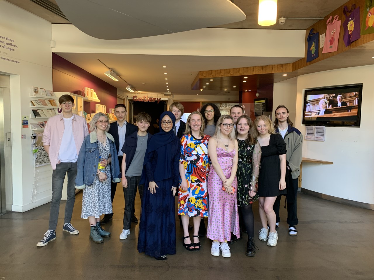 A group of creative media students stood inside of Quad Derby.