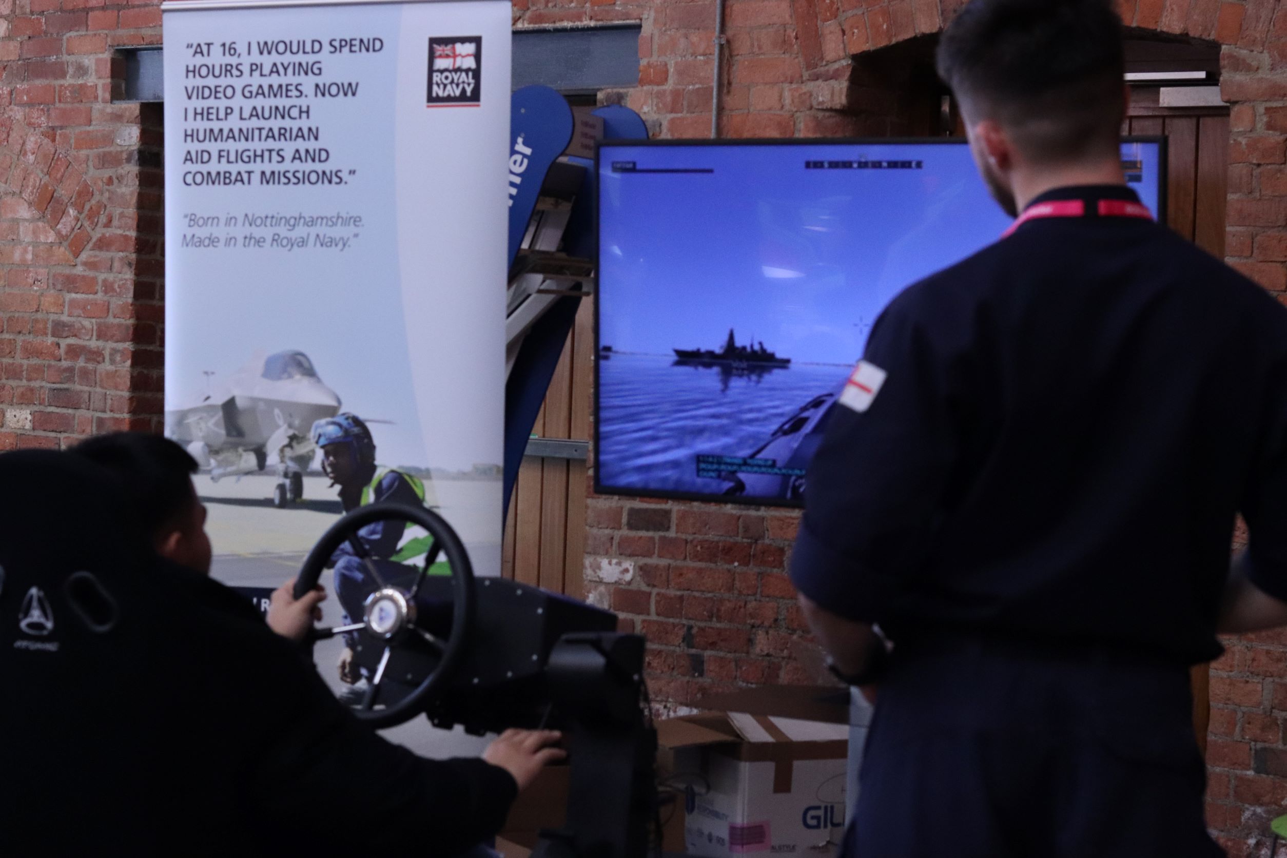 Student using a Royal Navy virtual reality game machine.