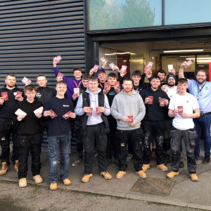 First year Rothenberger apprentices holding tools.