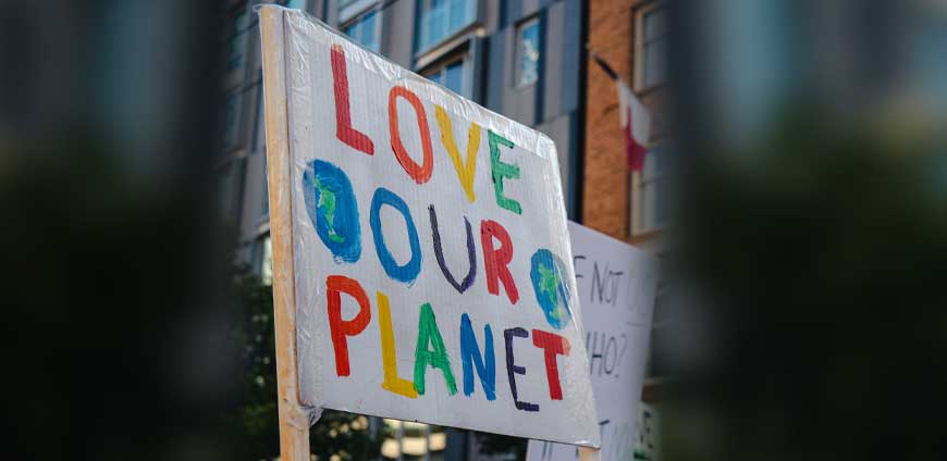 Sign reading love our planet
