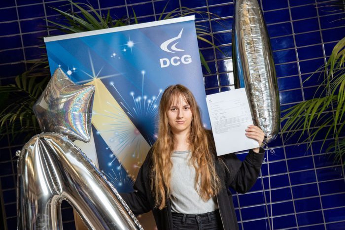 Justyna holding her results.