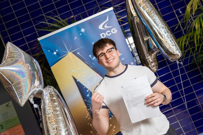 Oliver holding his results.