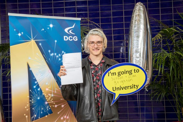 Adam holding his results.