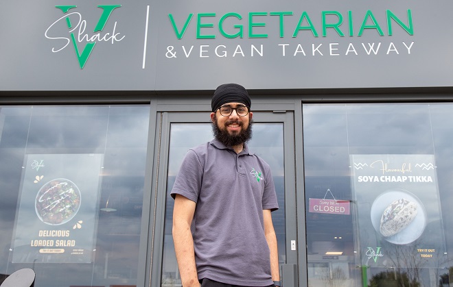 Charanjot Singh stood outside of his takeaway restaurant V Shack.