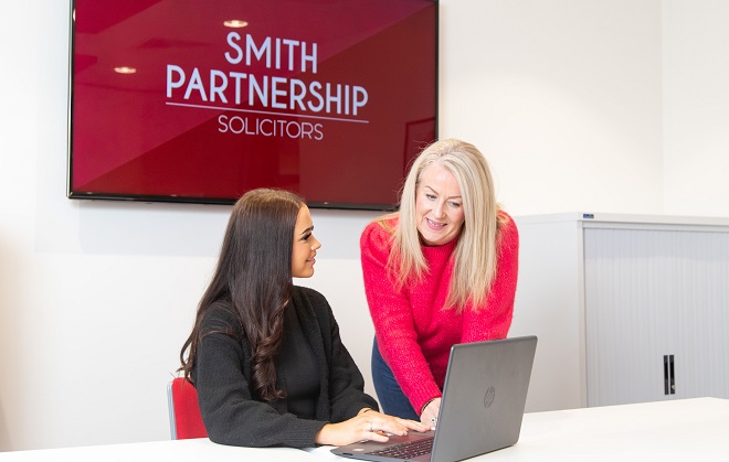 Former Derby College student Freya at work with her boss Claire Twells.