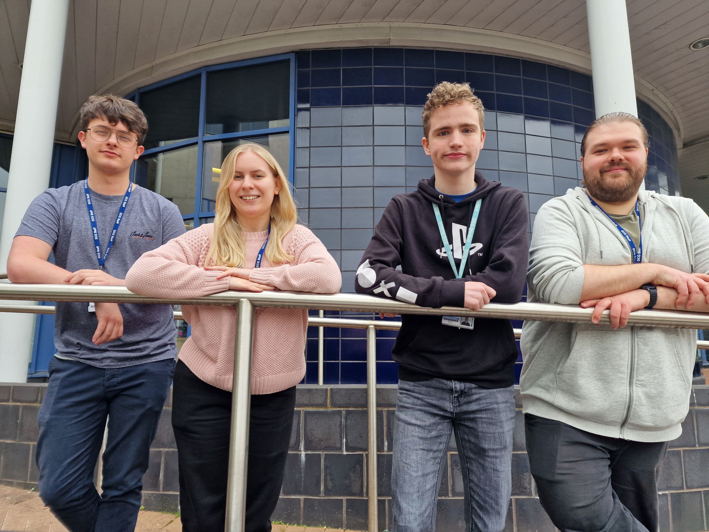 Daniel Ash with support worker Ben Kendall and Games Development teachers Leigh Champion and Nathan Rogers.