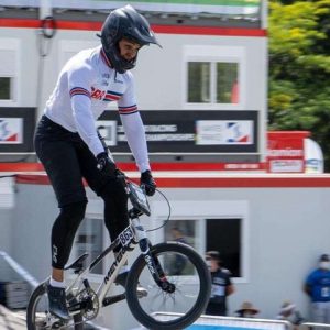 Jay Bovill riding a BMX at a competition.