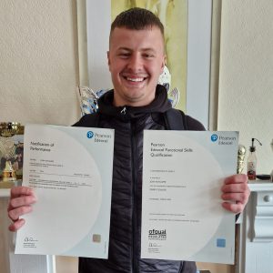 John Radcliffe with his certificates