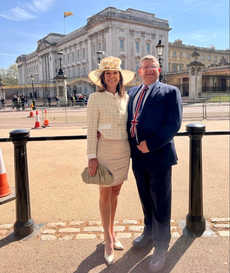 Jon Collins and Stephanie Meadows outside of Buckingham Palace.