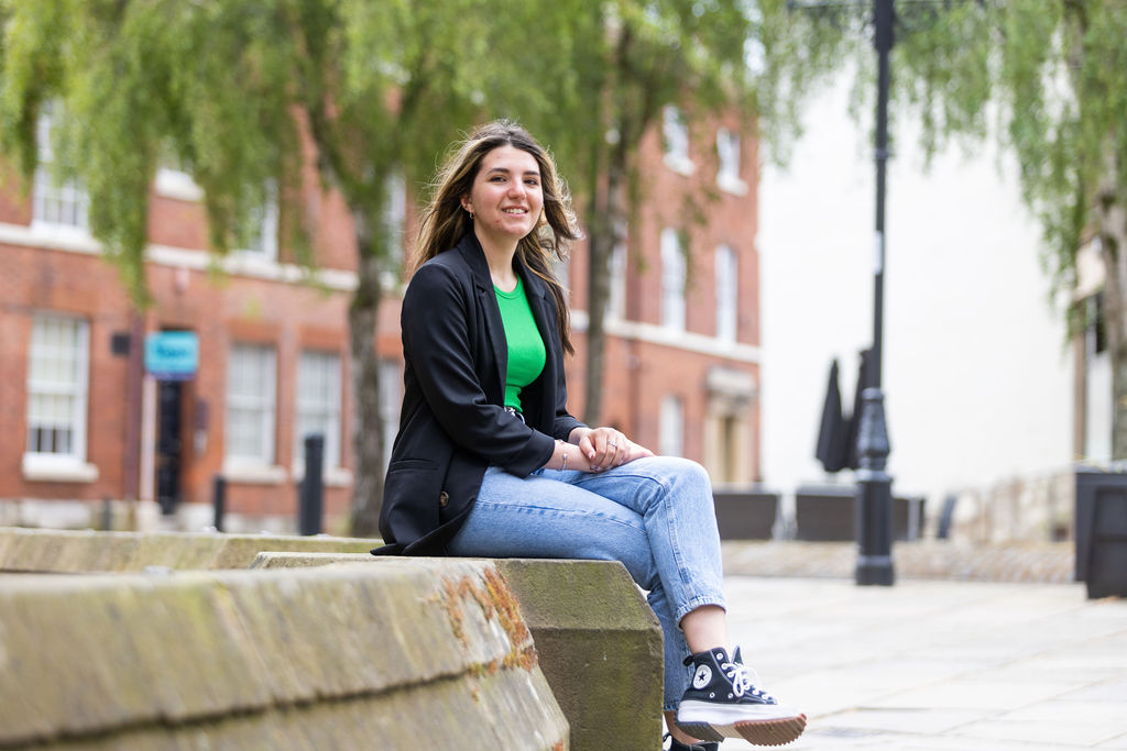 Former Derby College student Melissa sat outside of The Roundhouse