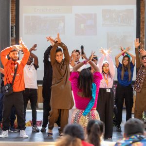 Lexis students being taught how to dance.