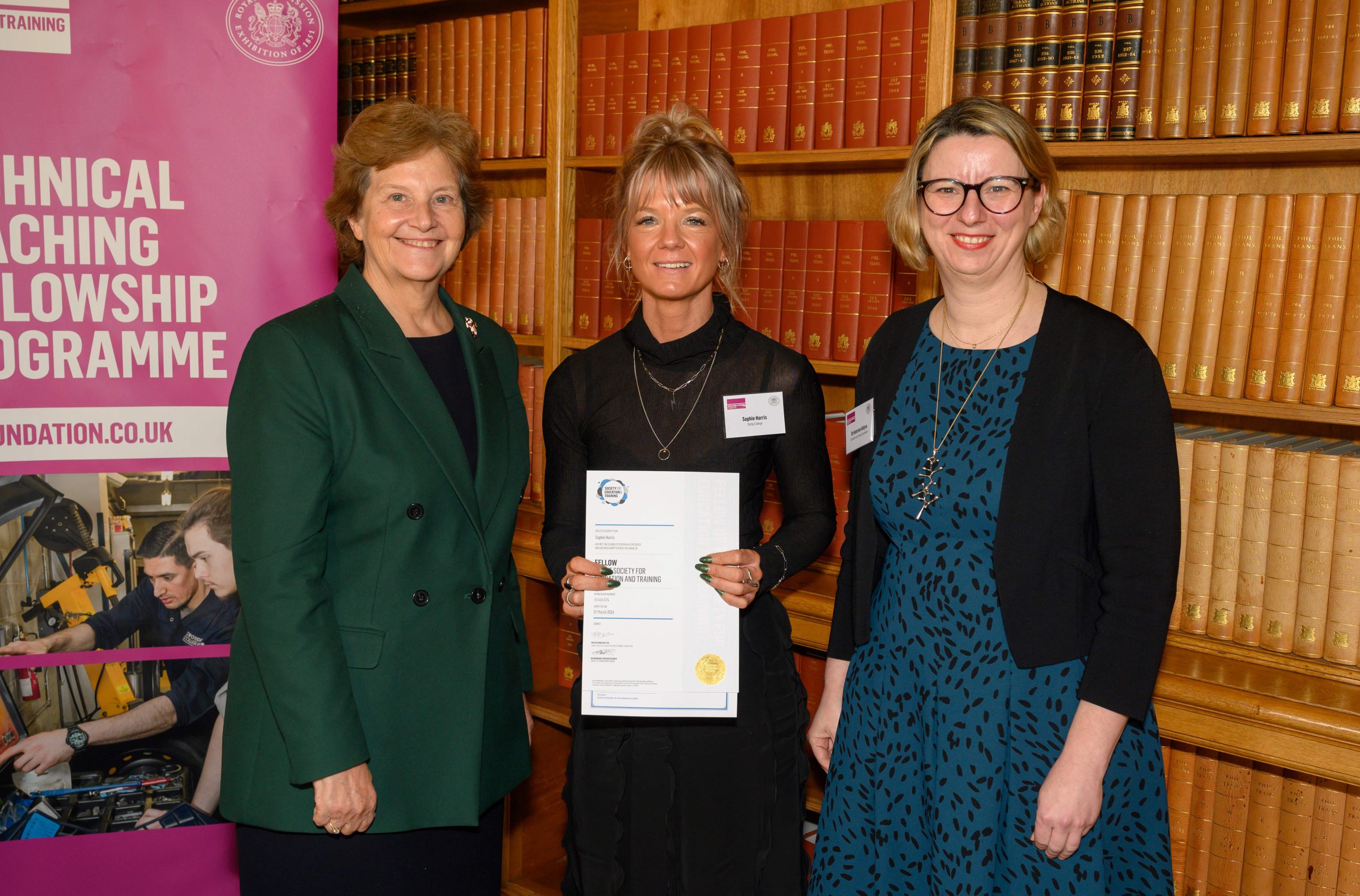 Three females, Professor Dame Ann Dowling OM FRS FREng (Commissioner and Chair of the Industry and Engineering Committee for the Royal Commission of the Exhibition of 1851) Sophie Harris and Dr Katerina Kolyva (Chief Executive Officer of the Education and Training Foundation). Sophie is holding her Fellowship.