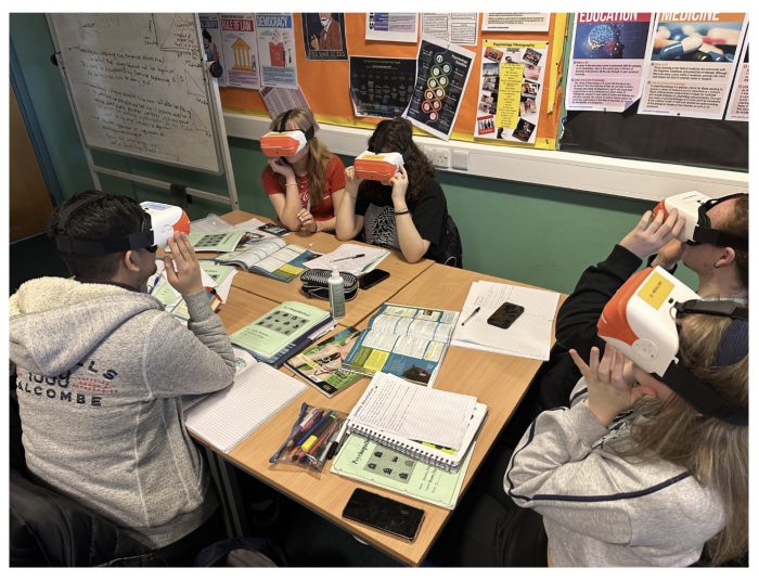 Students using the VR headsets in class.