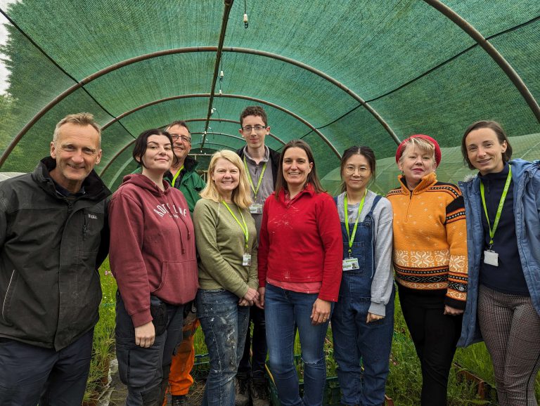 Group of Horticulture students stood by their garden