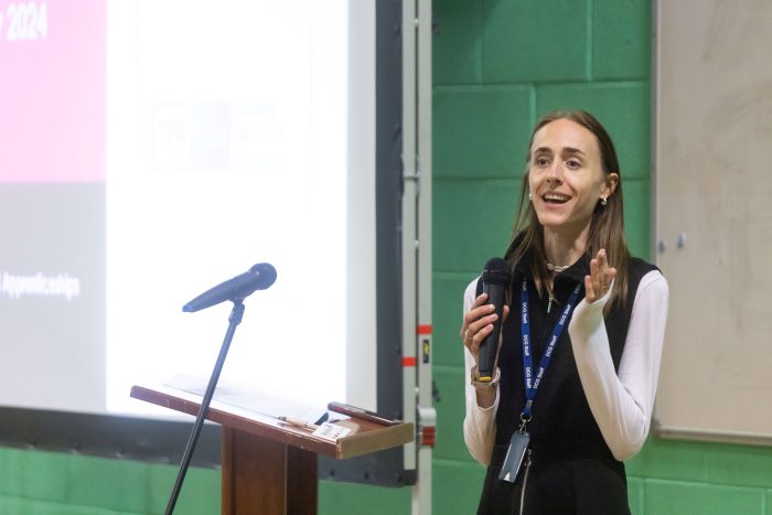 Animal Care HE lecturer Stacey Higgs addressing a room full of people