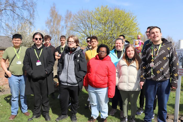 A group of students who designed and created the sculptures.