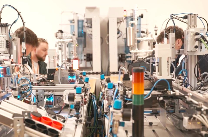 Students working on machines