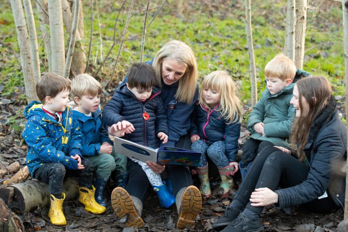 Teachers looking after young children.