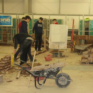Students working in construction class