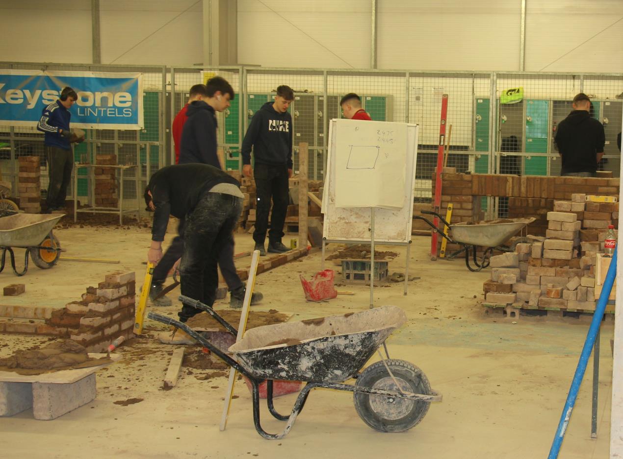 Students working in construction class