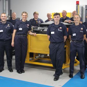 Automotive students and firefighters