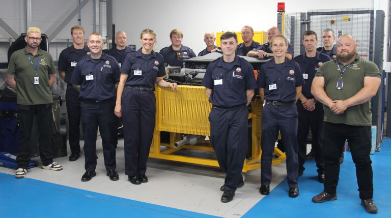 Automotive students and firefighters