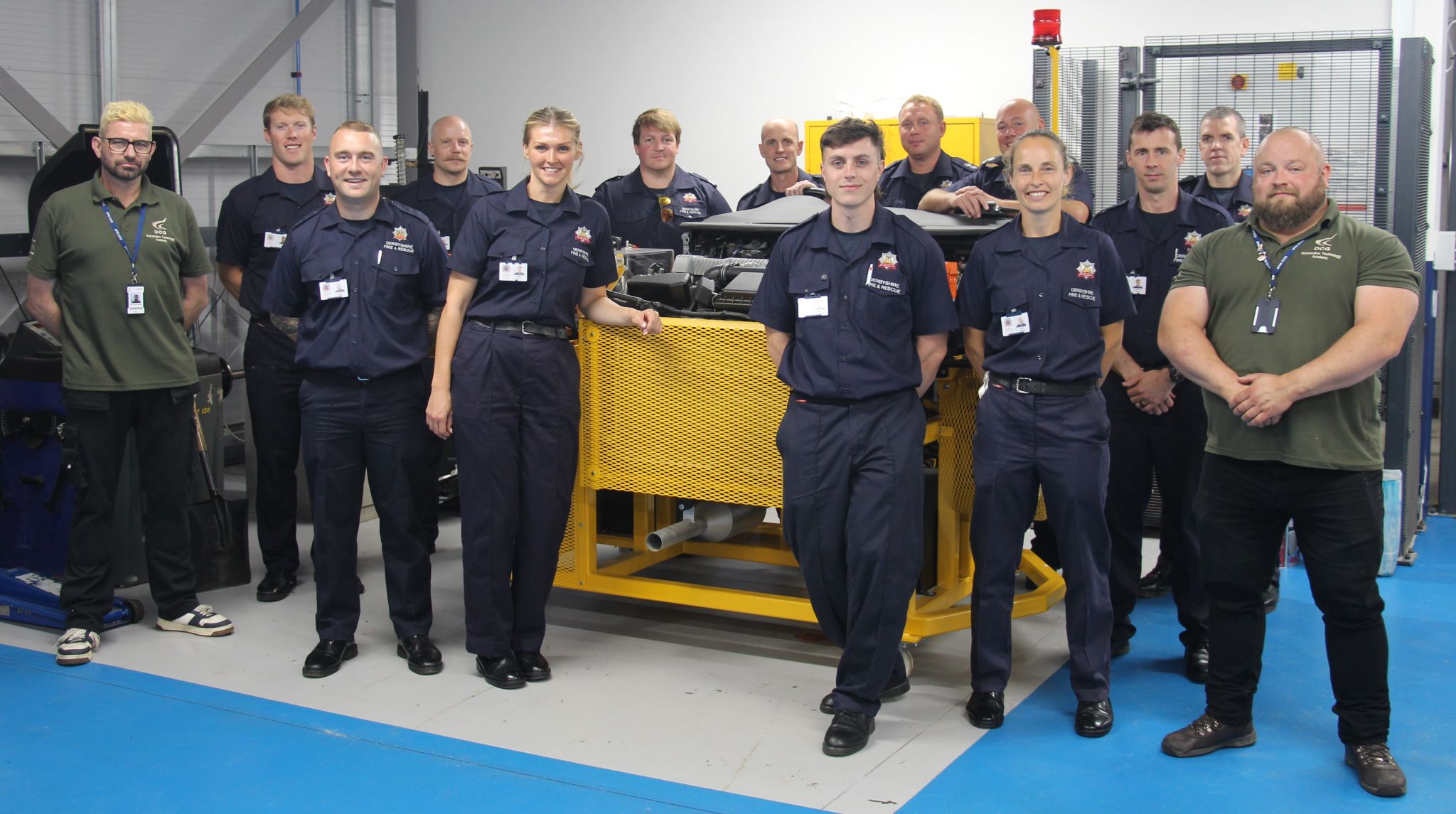 Automotive students and firefighters