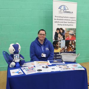 Person at an exhibition at DCG's Inclusion Showcase.