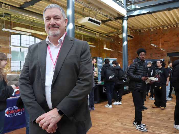 Guest speaker and organiser of Step into Cyber, Professor Steven Furnell, wearing a black suit jacket and white shirt.