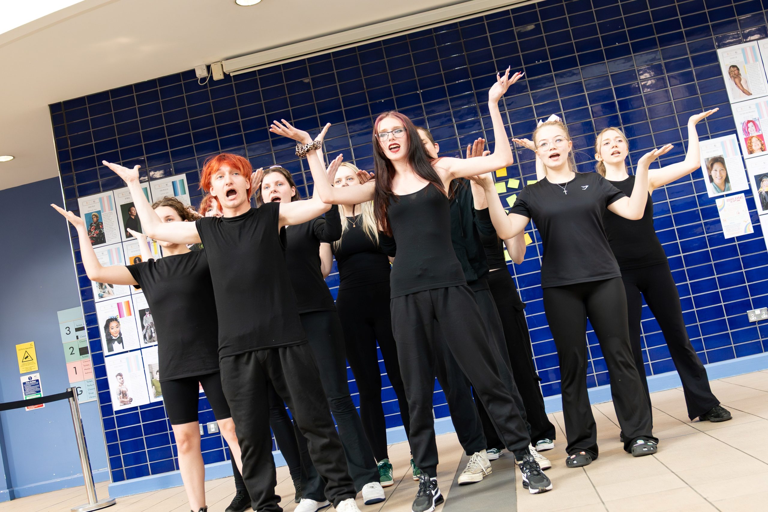 Performing arts students taking part in a live showcase at Derby College Creative & Digital Exhibition