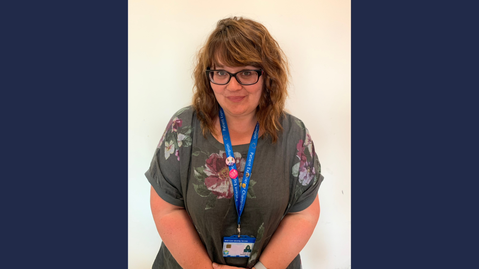 Learning and Development Advisor wearing a lanyard and ID badge, standing indoors during a Level 3 Fast Track Teaching Award case study